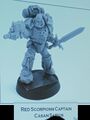 His unreleased 8th company Captain model for Fires of Cyraxus. Very similar to Sirae Karagon's, save for the Blade of the Scorpion and a combi-Inferno pistol